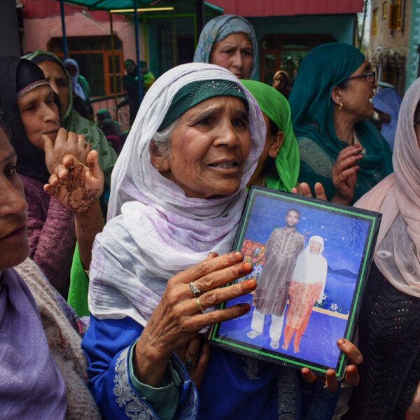 Srinagar tragedy: Mother’s vigil by Jhelum, photo of missing son in hand