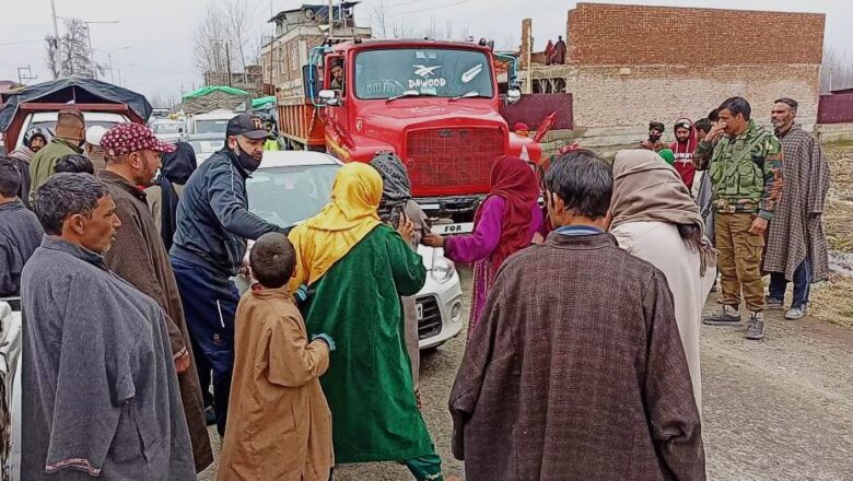 Demanding high capacity-transformer, People block Gulmarg road