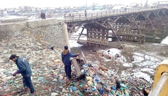 Waste flows into river Jhelum in Sumbal, Hajin