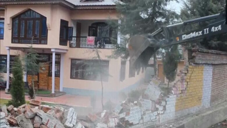 Admin demolishes ‘extension wall’ of militant commander’s house in Anantnag