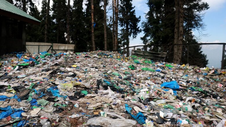 Visitors freely throw trash in the open meadows of Sonamarg