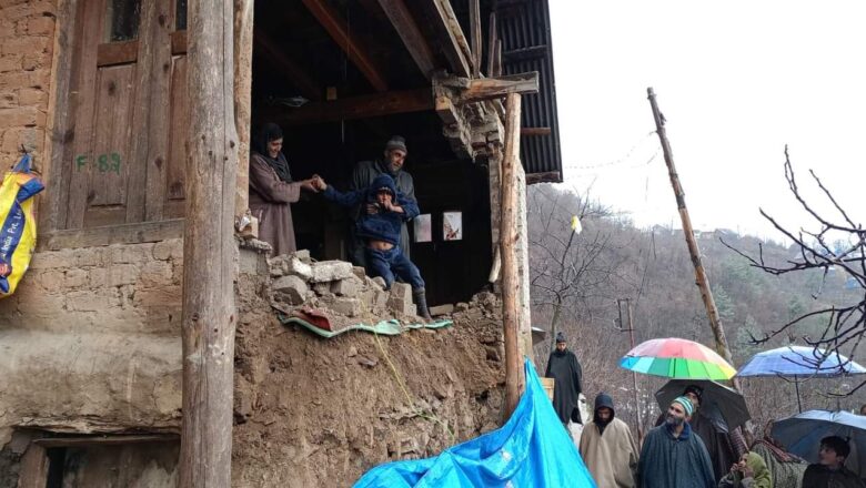 Residential house damaged due to heavy winds in Kulgam area