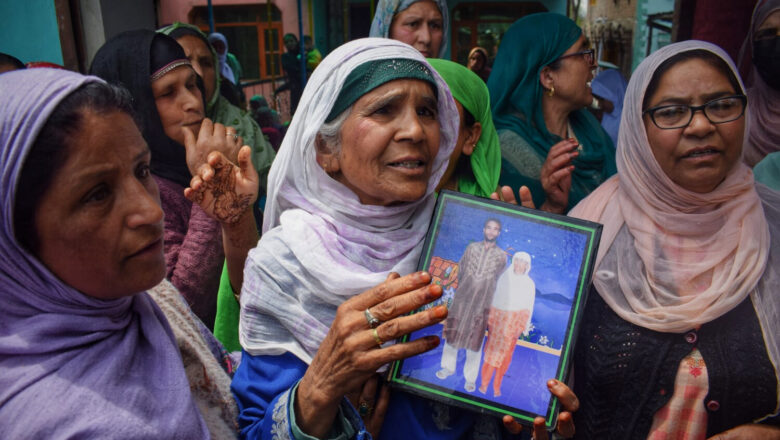 Srinagar tragedy: Mother’s vigil by Jhelum, photo of missing son in hand
