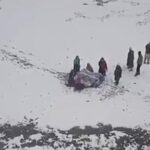 Tribal woman delivers baby on snow bound road in Kupwara