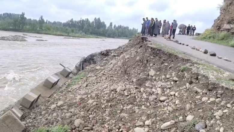 Rainfall washes away portion of road in Laisoo Kulgam